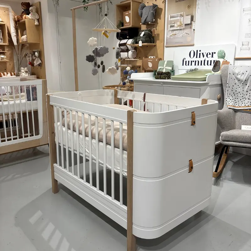 Ex-Display Oliver Wood Mini+ Cot Bed – White/Oak with Extension Kit & Mattress (Collection Only)